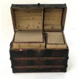 SARATOGA DOME TOP TRUNK with wood banding and a fitted interior with a lift out tray, on castors,