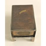 JAPANESE SILVER MATCHBOX COVER with an inset copper panel decorated with a hummingbird, raised on