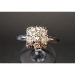 DIAMOND CLUSTER RING the diamonds totalling approximately 0.6cts, on fourteen carat white gold