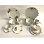 RIDGEWAY POTTERIES ROYAL VALE PATTERN TEA SET with purple floral decoration, comprising six cups and