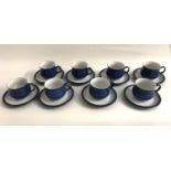 DENBY COFFEE SET comprising eight cups and saucers, in dappled blue glaze