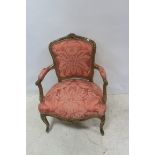 A 19th CENTURY CONTINENTAL GILTWOOD AND UPHOLSTERED ARMCHAIR,