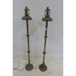 A PAIR OF GOTHIC DESIGN BRASS LAMPS,