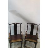 A PAIR OF ORIENTAL HARDWOOD ELBOW CHAIRS,