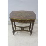 A CONTINENTAL KINGWOOD CROSS BANDED AND GILT BRASS MOUNTED TABLE,