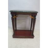 AN EMPIRE DESIGN MAHOGANY AND PARCEL GILT CONSOLE TABLE,