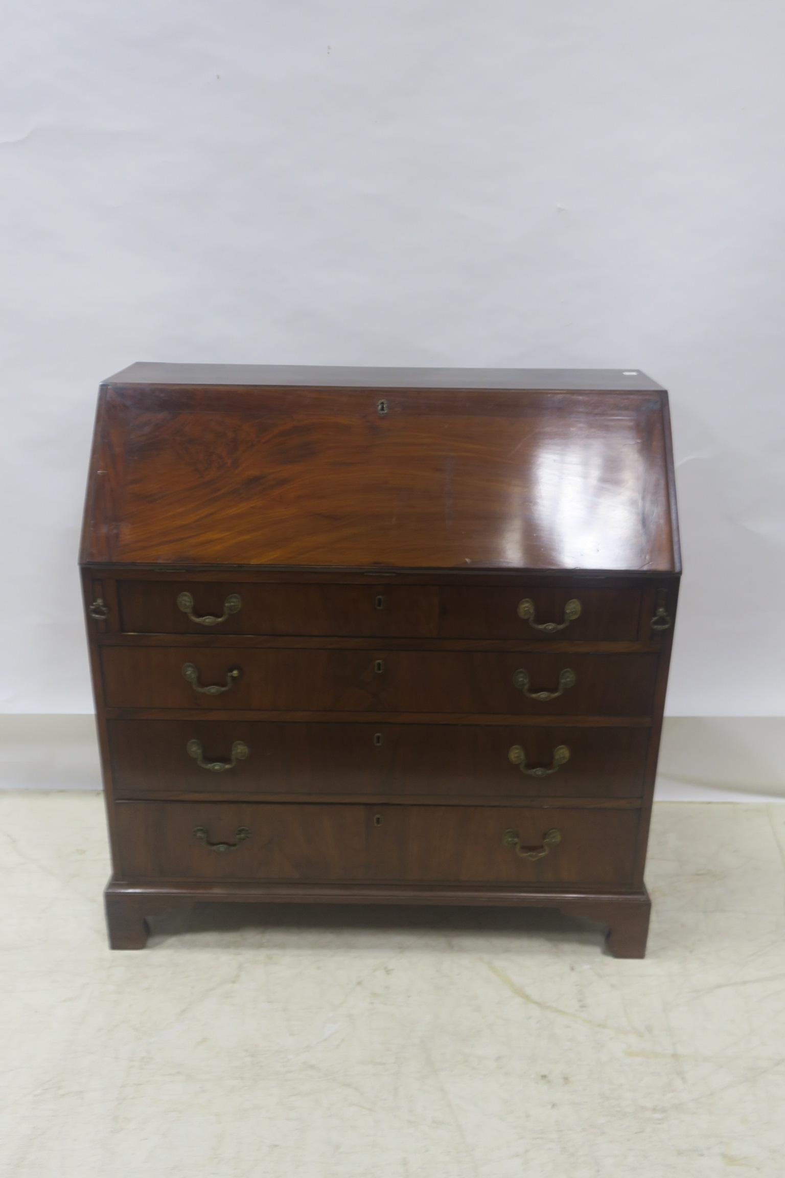 A GEORGIAN MAHOGANY BUREAU,