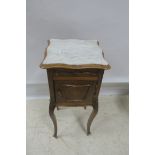 A CONTINENTAL KINGWOOD PEDESTAL,