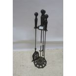 A FORGED STEEL THREE PIECE COMPANION SET,