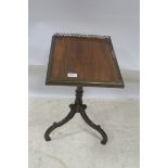 A REGENCY MAHOGANY WINE TABLE,