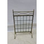 A 19th CENTURY BRASS AND BEVELLED GLASS FIRESCREEN,