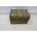 A CANVAS UPHOLSTERED TRAVELLING TRUNK,