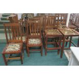 A GOOD SET OF FIVE HARDWOOD DINING CHAIRS, each with a vertical splat and woven seats on moulded,