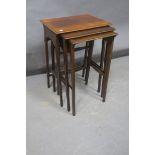 A NEST OF THREE MAHOGANY TABLES,