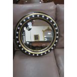 A PAIR OF WATERFORD STYLE EBONISED AND PARCEL GILT MIRRORS,