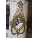 A CONTINENTAL GILT FRAME MIRROR,