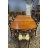 A 19th CENTURY MAHOGANY ELEVEN PIECE DINING ROOM SUITE, comprising ten chairs,