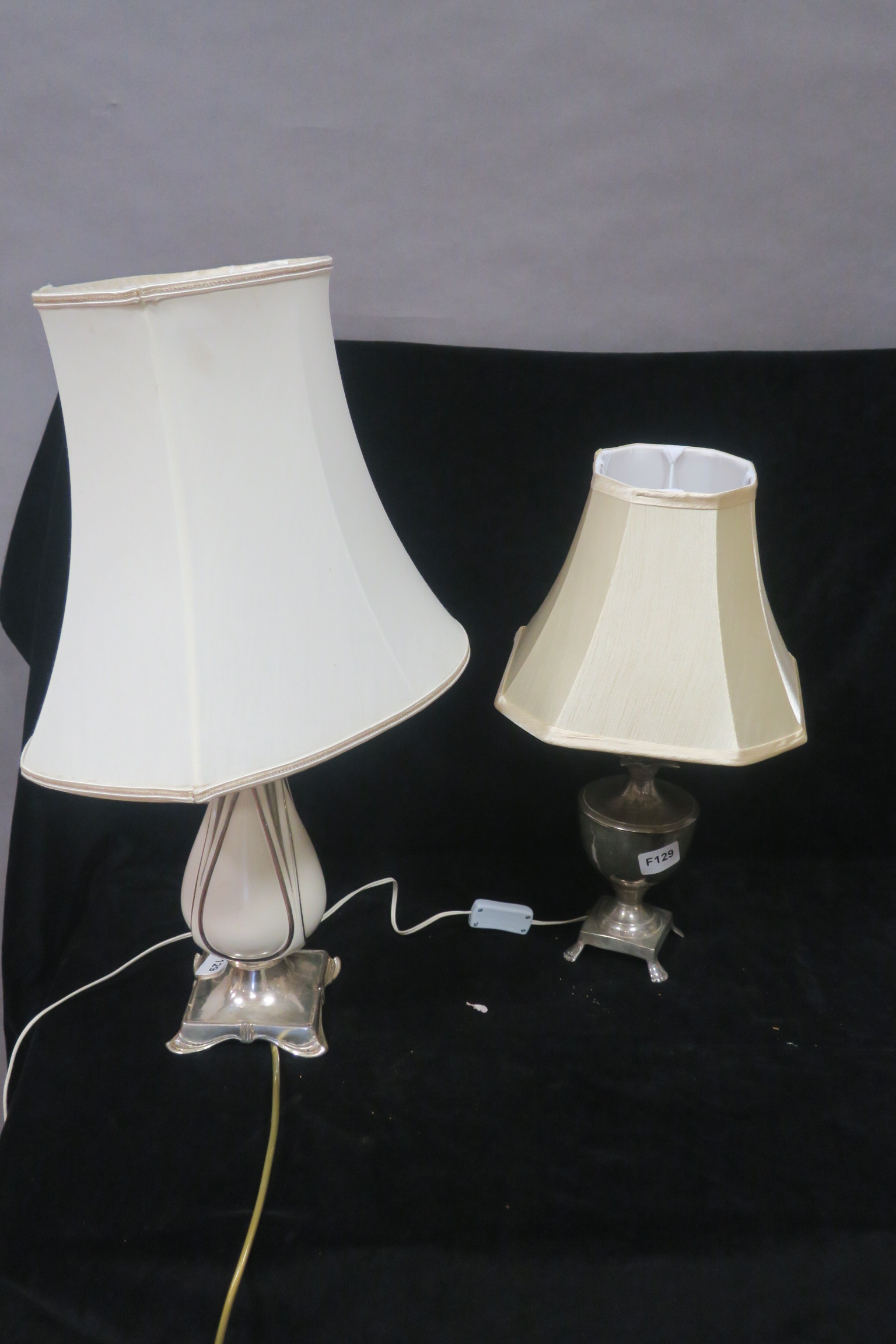 A PLATED TABLE LAMP, together with a plated and porcelain table lamp,