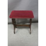 AN ARTS AND CRAFTS MAHOGANY STOOL,