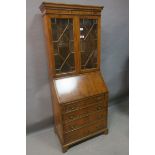 A GEORGIAN DESIGN YEW WOOD BUREAU BOOKCASE,