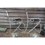 A PAIR OF 19TH CENTURY WROUGHT IRON BENCH ENDS with scroll decoration