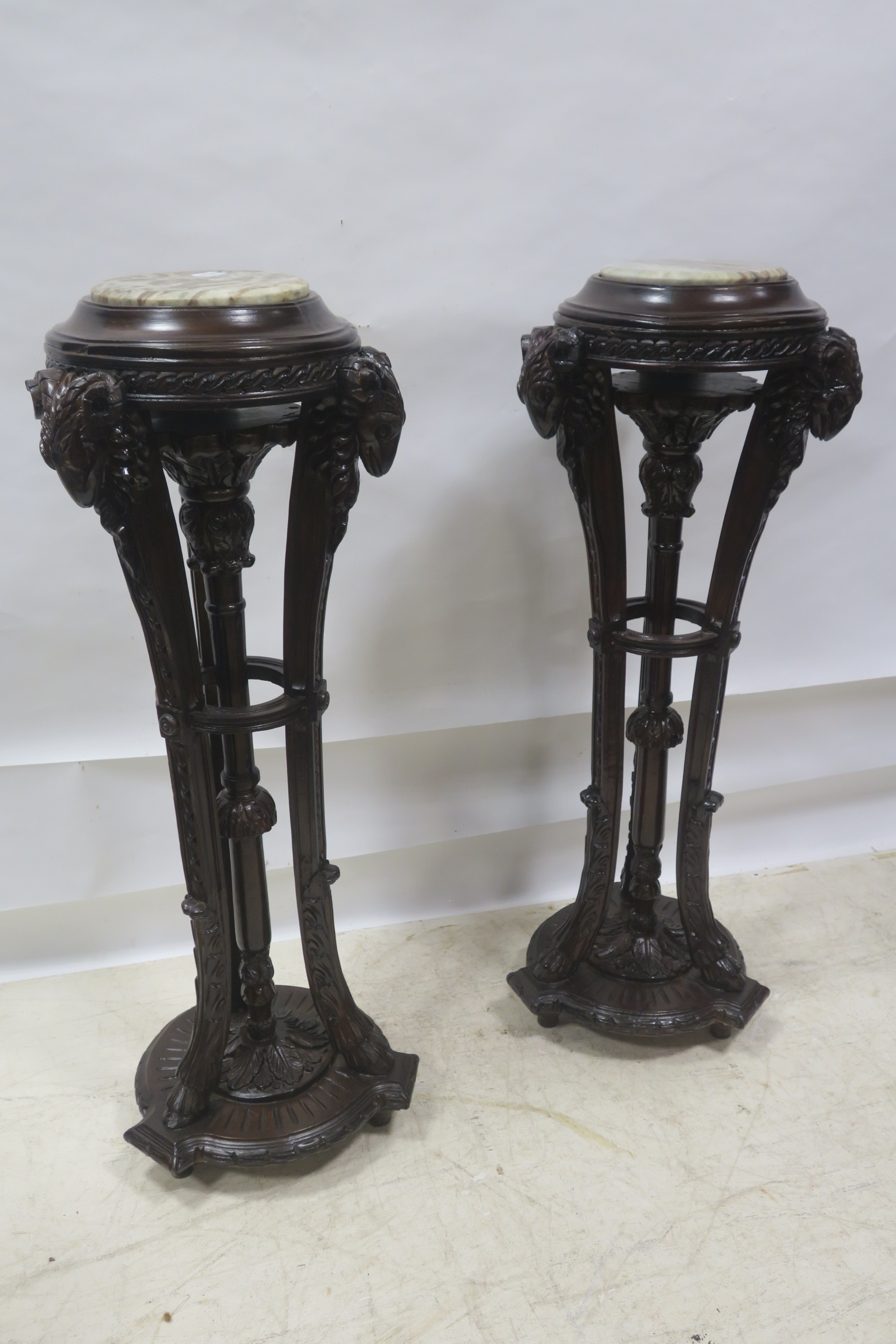 A PAIR OF CONTINENTAL HARDWOOD JARDINIERE STANDS,