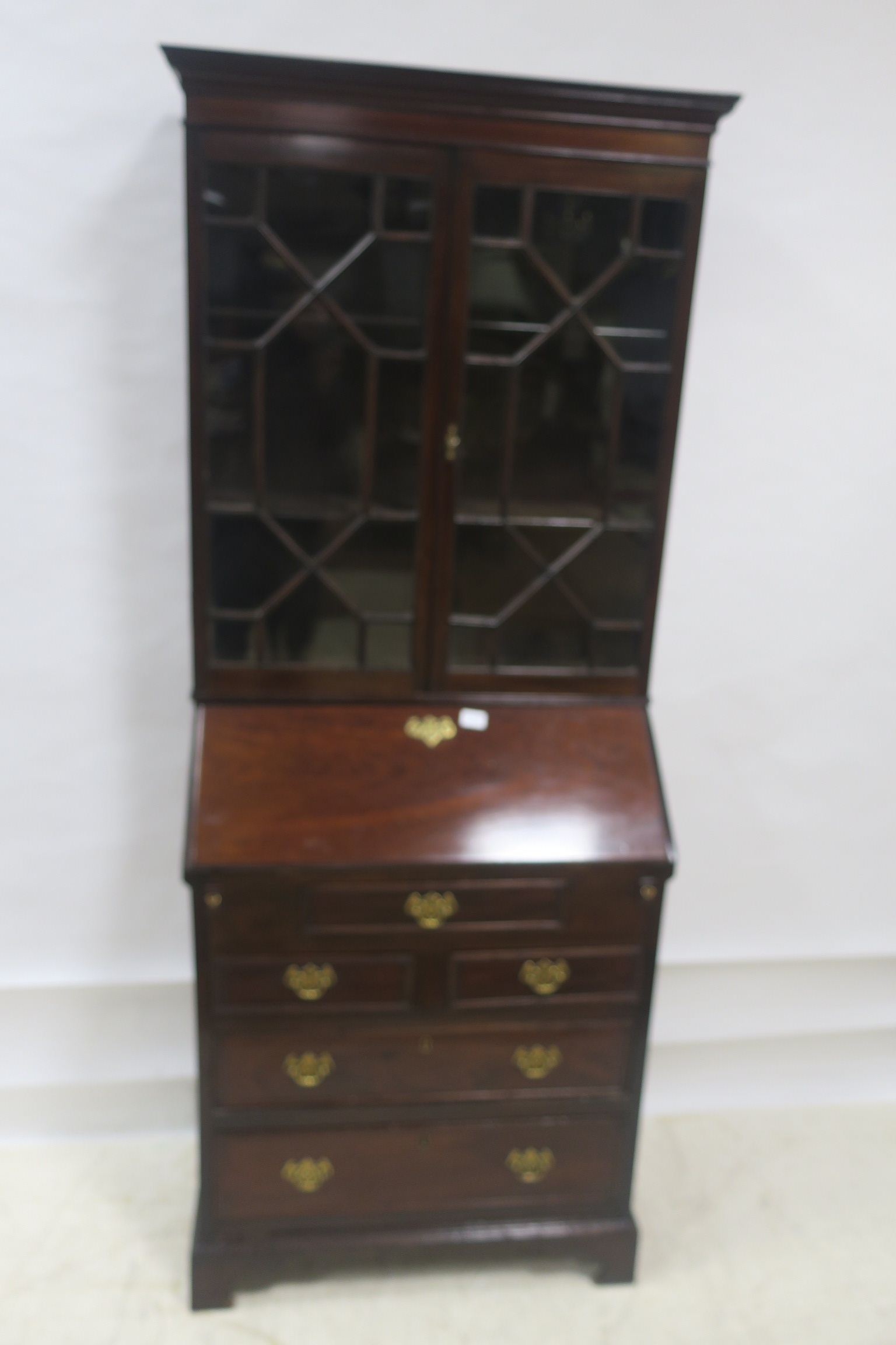 A GEORGIAN MAHOGANY BUREAU BOOKCASE,