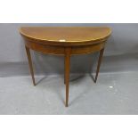 A SHERATON DESIGN MAHOGANY AND CROSS BANDED FOLDOVER CARD TABLE,