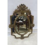A CONTINENTAL GILT FRAME COMPARTMENTED MIRROR,