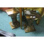 A PAIR OF CARVED WOOD PEDESTALS,