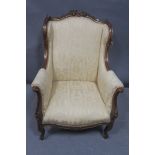 A GOOD 19th CENTURY CONTINENTAL CARVED GILTWOOD AND UPHOLSTERED WING CHAIR,