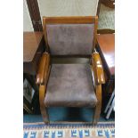 A PAIR OF CONTEMPORARY BROWN LEATHER UPHOLSTERED CHROME MOUNTED ARMCHAIRS,