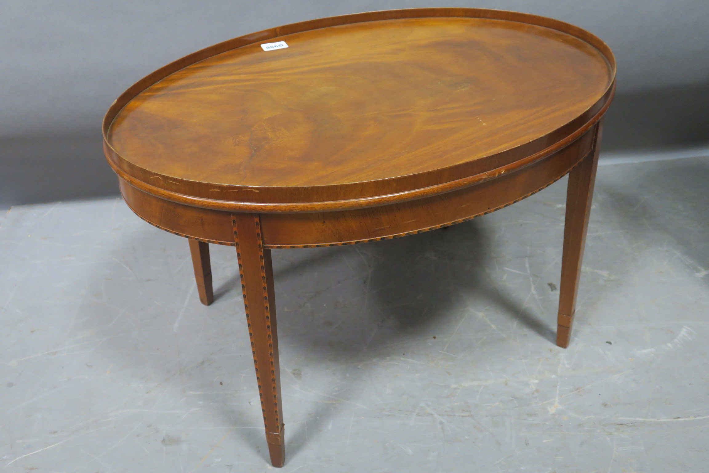 A MAHOGANY COFFEE TABLE,