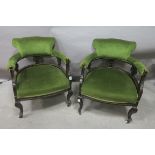 A PAIR OF 19th CENTURY MAHOGANY AND UPHOLSTERED TUB SHAPED CHAIRS,