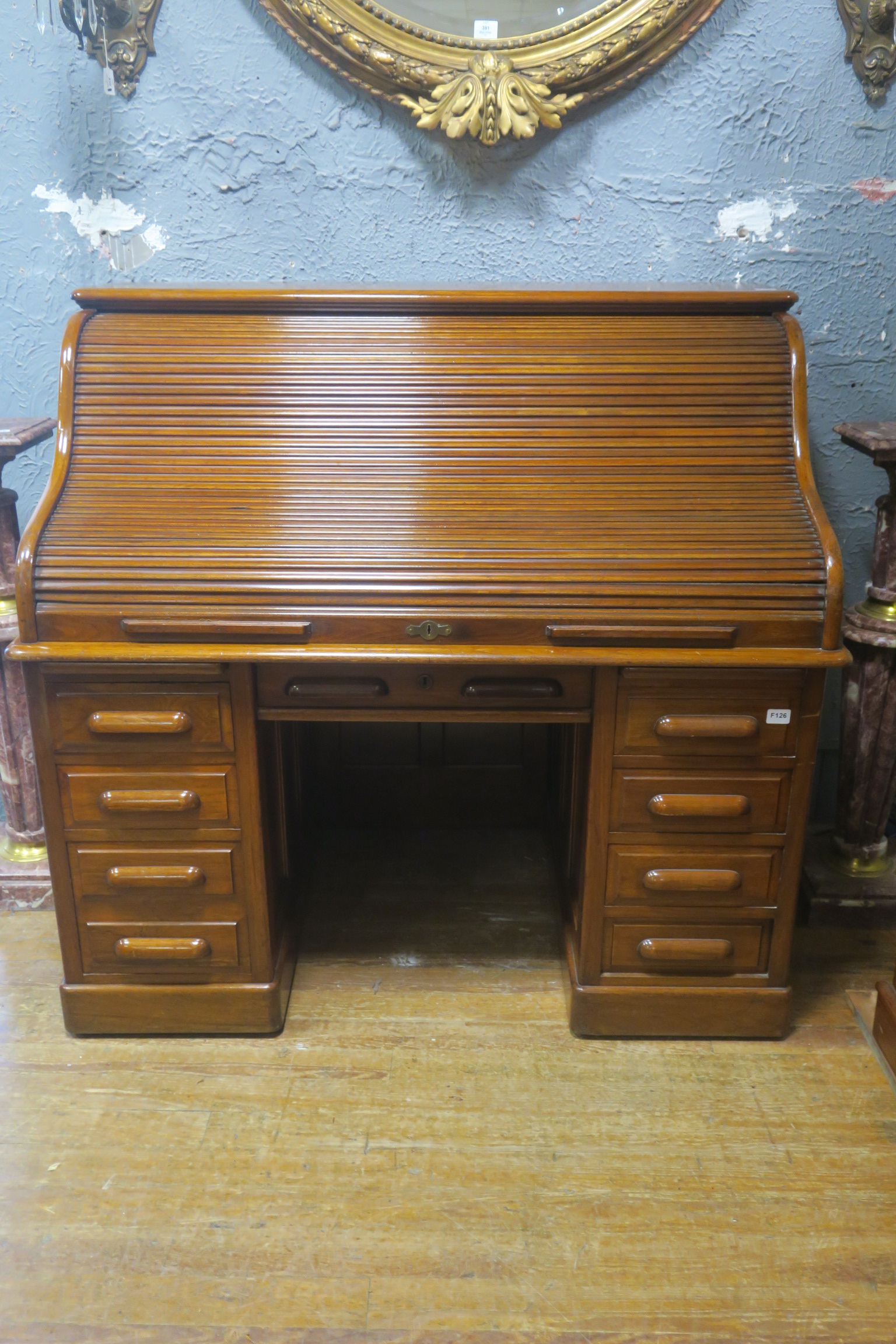 A VERY FINE WALNUT ROLL TOP DESK,