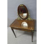 A CONTINENTAL MAHOGANY AND GILT BRASS DRESSING TABLE,