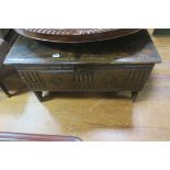 AN EARLY OAK COFFER,