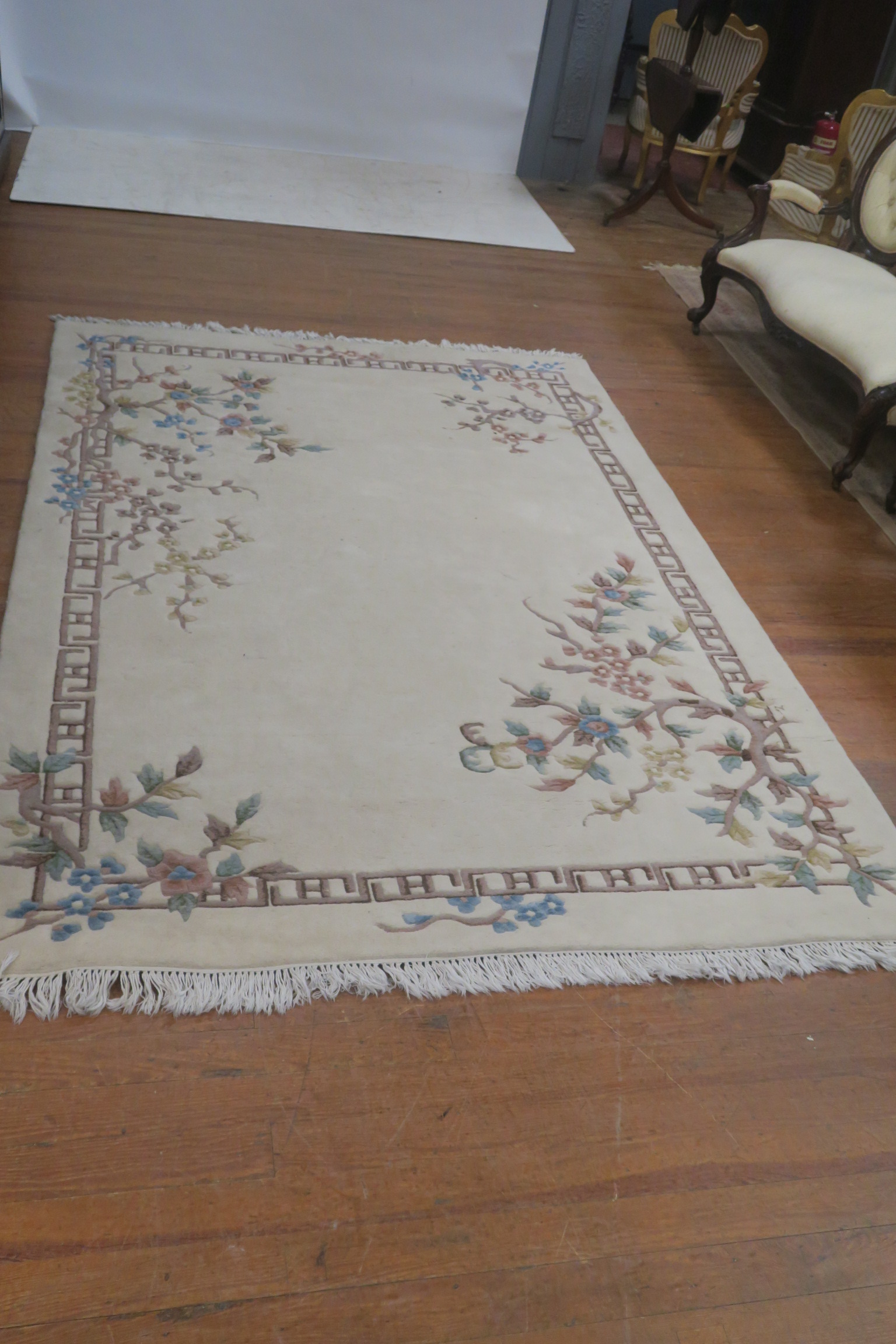 A CHINESE WOOL RUG,