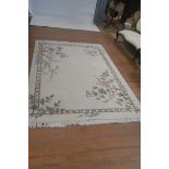 A CHINESE WOOL RUG,