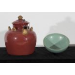 A CONTEMPORARY CELADON GREEN BOWL,