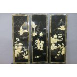 A SET OF FOUR CHINESE LAQUERED PANELS overlaid by mother of pearl depicting figures in a landscape