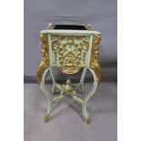 A CONTINENTAL GILTWOOD AND POLYCHROME JARDINIERE STAND,