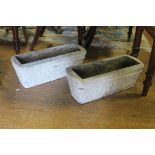 A PAIR OF COMPOSITION STONE TROUGHS,