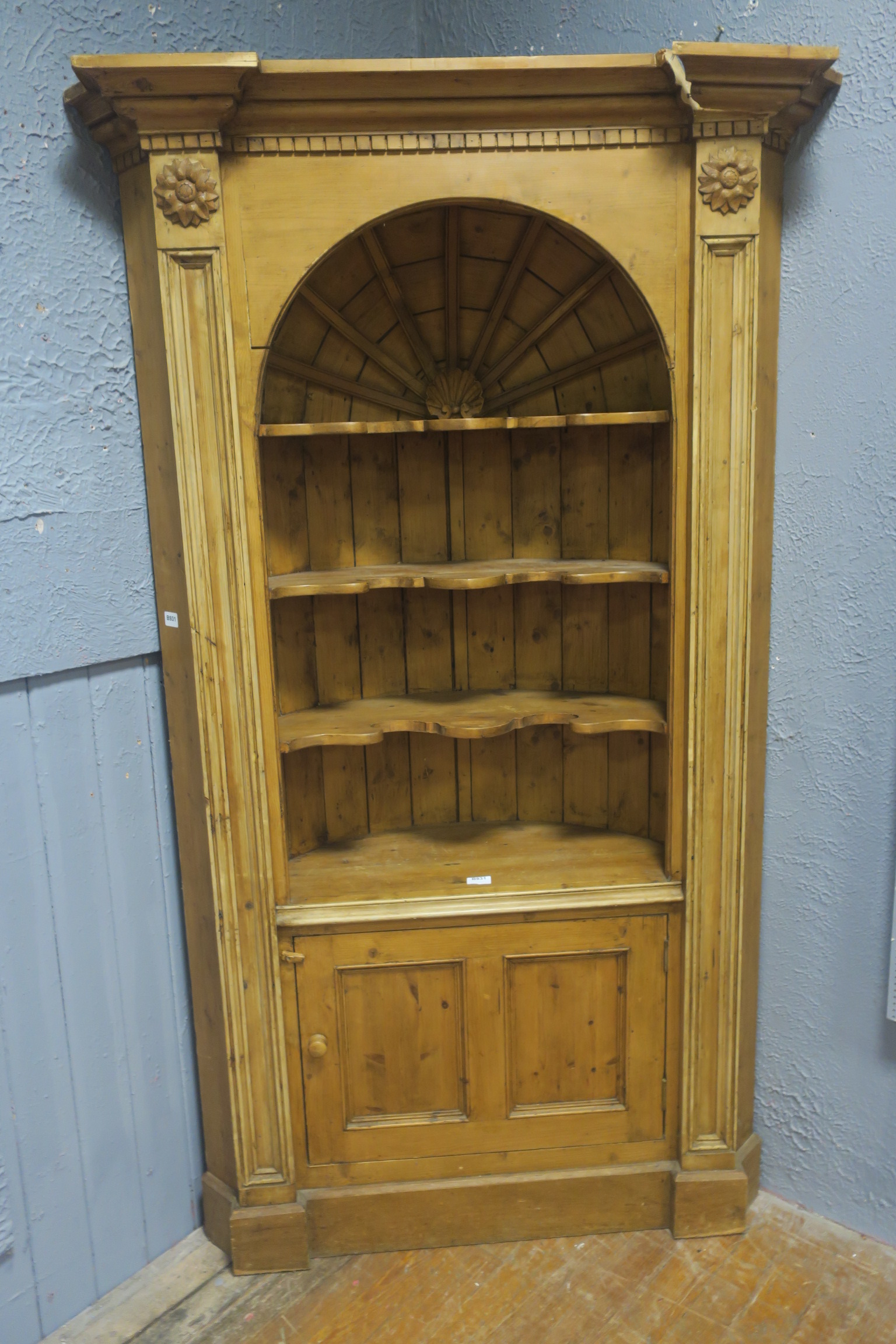 A PINE OPEN FRONT CORNER DRESSER,