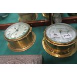 A BRASS SHIPS BAROMETER together with a brass clock,