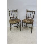 A GOOD PAIR OF 19th CENTURY EBONISED PARCEL GILT AND POLYCHROME SIDE CHAIRS,
