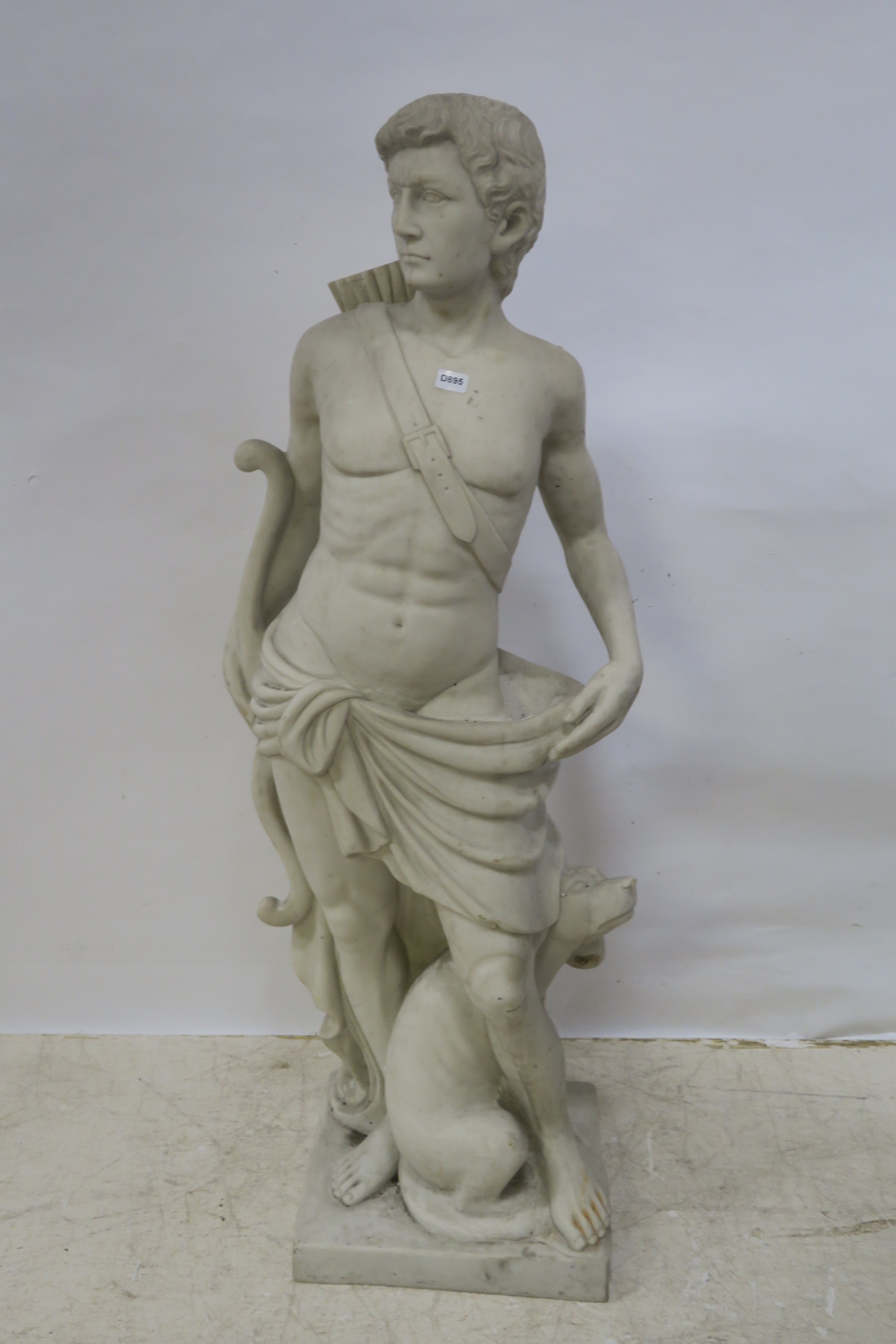 A SIMULATED MARBLE FIGURE,