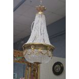 A FINE CONTINENTAL GILT BRASS AND CUT GLASS BASKET CHANDELIER,