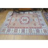 A TURKISH WOOL RUG,