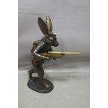 AN AMUSING BRONZE FIGURE,